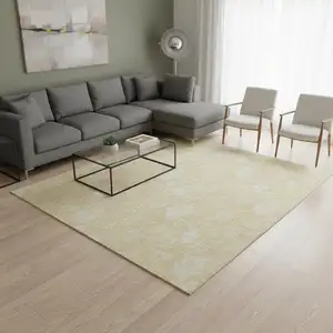 Photo of Amber And Ivory Floral Washable Area Rug With UV Protection