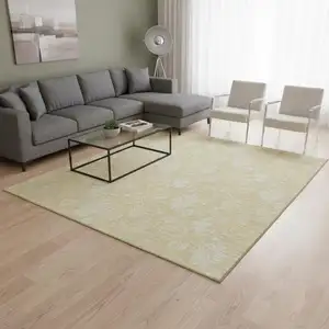 Photo of Amber And Ivory Floral Washable Area Rug With UV Protection