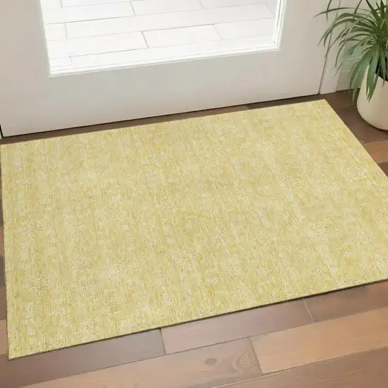 Amber And Ivory Floral Washable Area Rug With UV Protection Photo 1