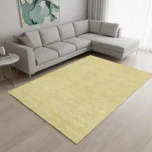 Photo of Amber And Ivory Floral Washable Area Rug With UV Protection