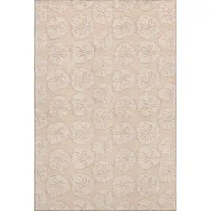 Photo of Apricot And Ivory Geometric Washable Area Rug With UV Protection