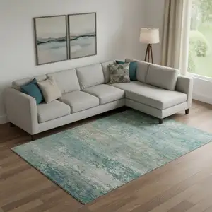 Photo of Aqua And Beige Abstract Washable Area Rug With UV Protection