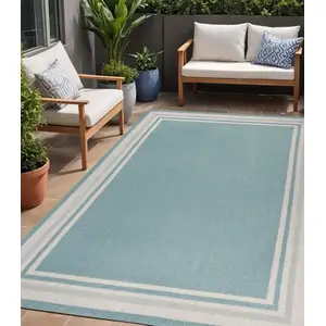 Photo of Aqua And Beige Striped Indoor Outdoor Area Rug