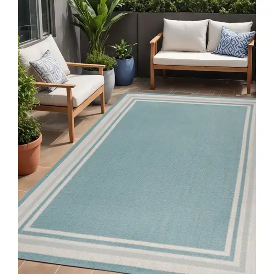 Aqua And Beige Striped Indoor Outdoor Area Rug Photo 1