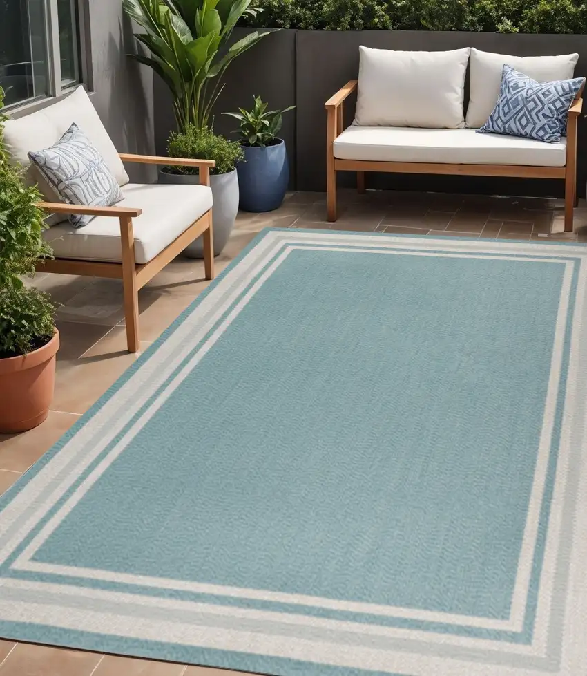 Aqua And Beige Striped Indoor Outdoor Area Rug Photo 1