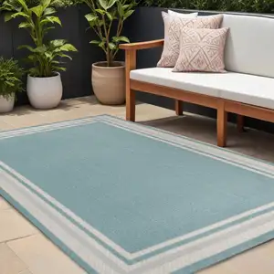 Photo of Aqua And Beige Striped Indoor Outdoor Area Rug