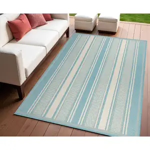 Photo of Aqua And Beige Striped Indoor Outdoor Area Rug