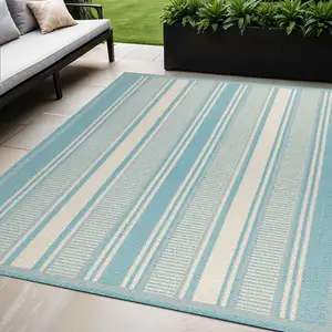 Photo of Aqua And Beige Striped Indoor Outdoor Area Rug