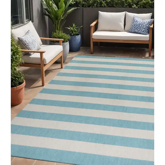Aqua And Cream Striped Indoor Outdoor Area Rug Photo 1