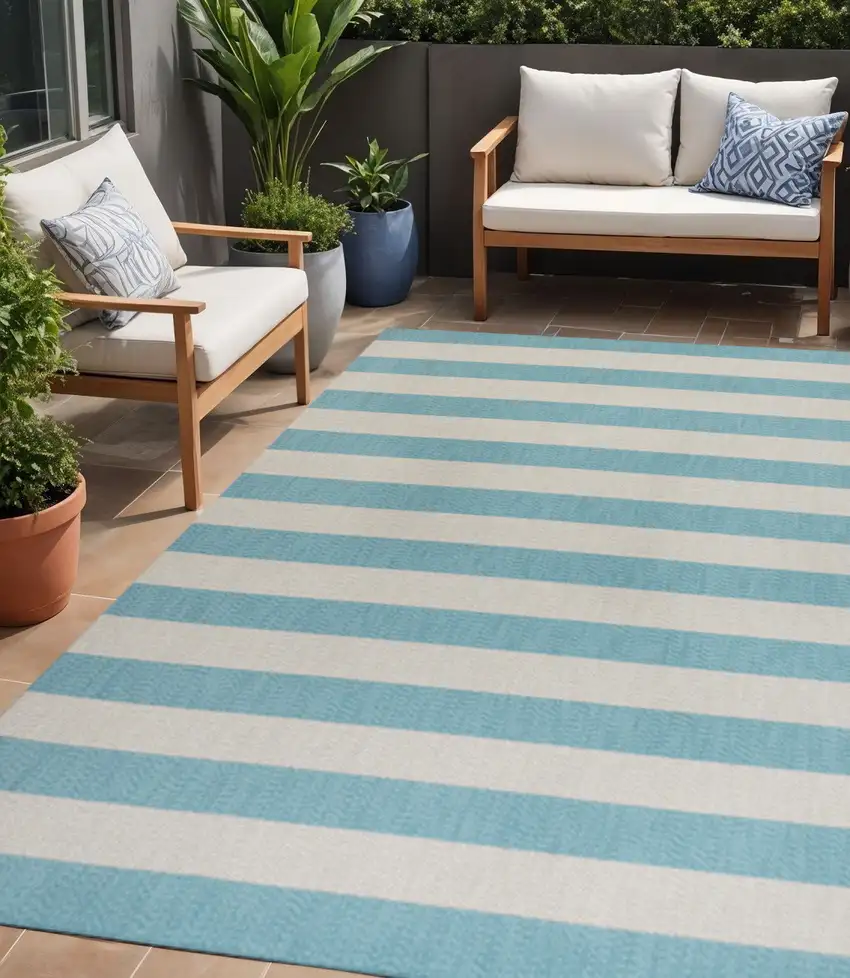 Aqua And Cream Striped Indoor Outdoor Area Rug Photo 1