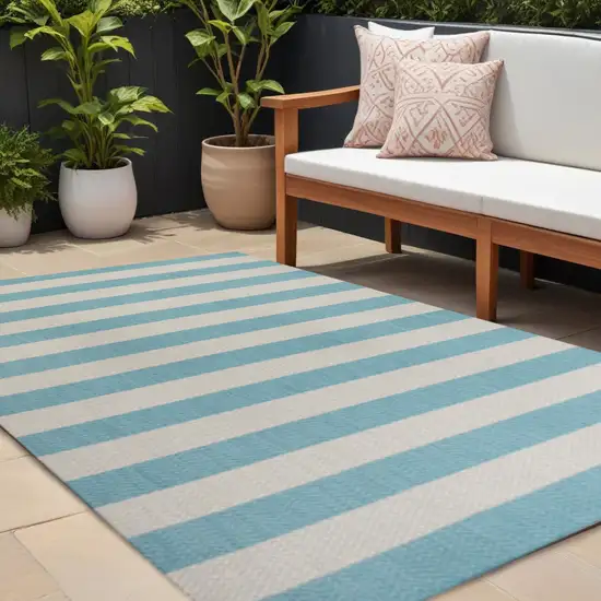 Aqua And Cream Striped Indoor Outdoor Area Rug Photo 1