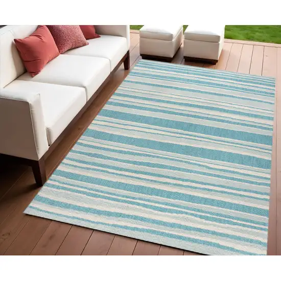 Aqua And Cream Striped Indoor Outdoor Area Rug Photo 1