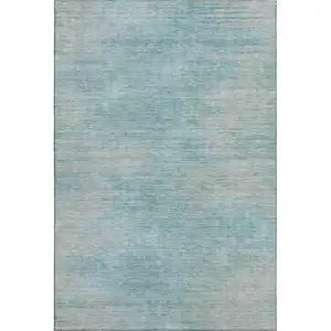 Photo of Aqua And Gray Abstract Washable Area Rug With UV Protection