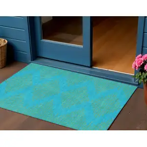 Photo of Aqua And Green Geometric Washable Indoor Outdoor Area Rug