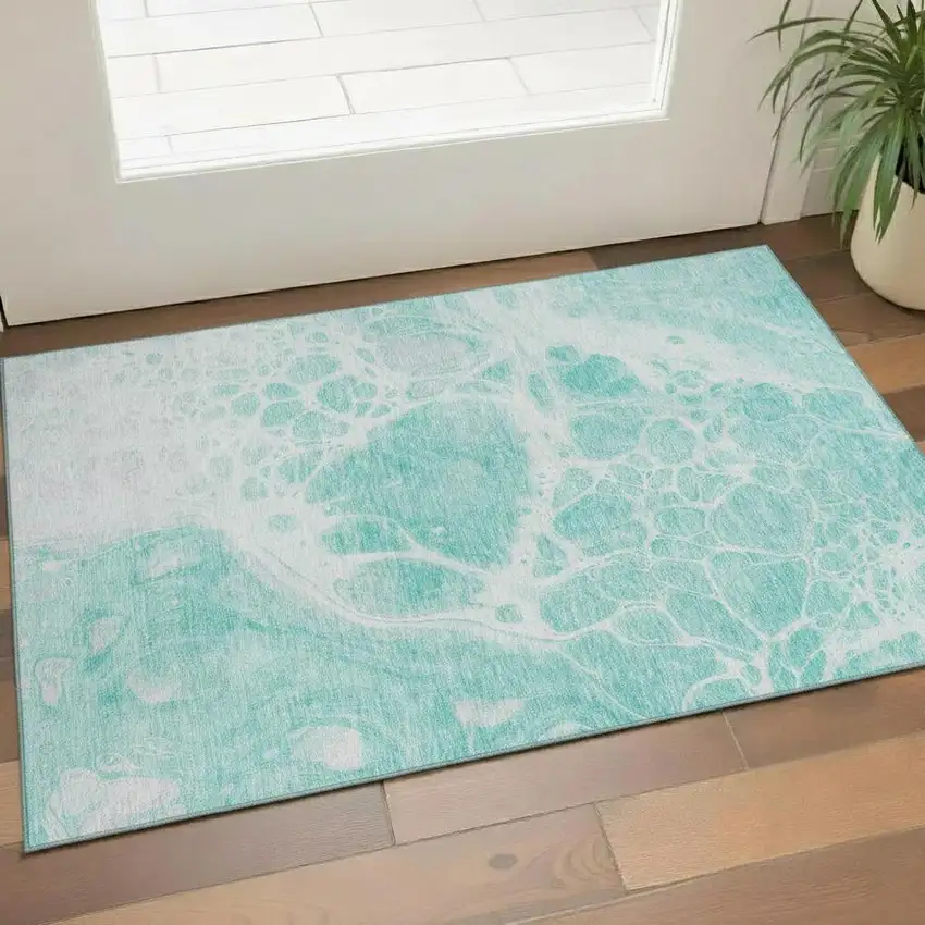 Aqua And Ivory Abstract Washable Area Rug With UV Protection Photo 1