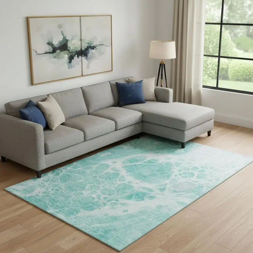 Aqua And Ivory Abstract Washable Area Rug With UV Protection Photo 1