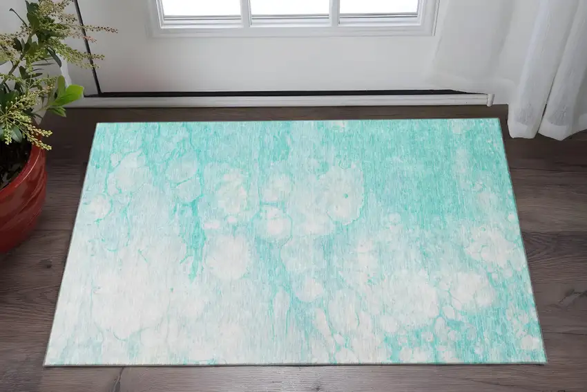 Aqua And Ivory Abstract Washable Area Rug With UV Protection Photo 2