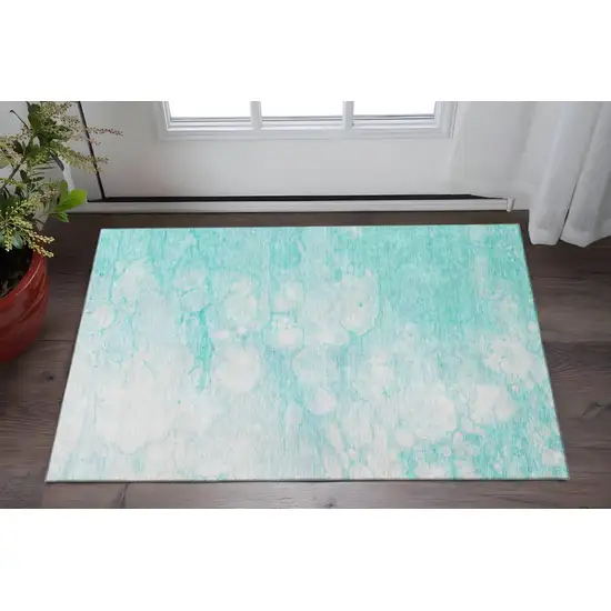 Aqua And Ivory Abstract Washable Area Rug With UV Protection Photo 2