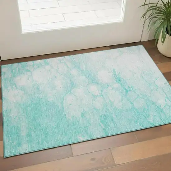 Aqua And Ivory Abstract Washable Area Rug With UV Protection Photo 1
