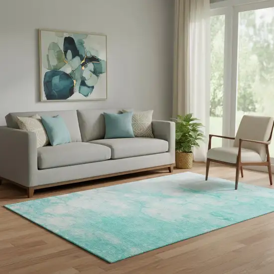 Aqua And Ivory Abstract Washable Area Rug With UV Protection Photo 1
