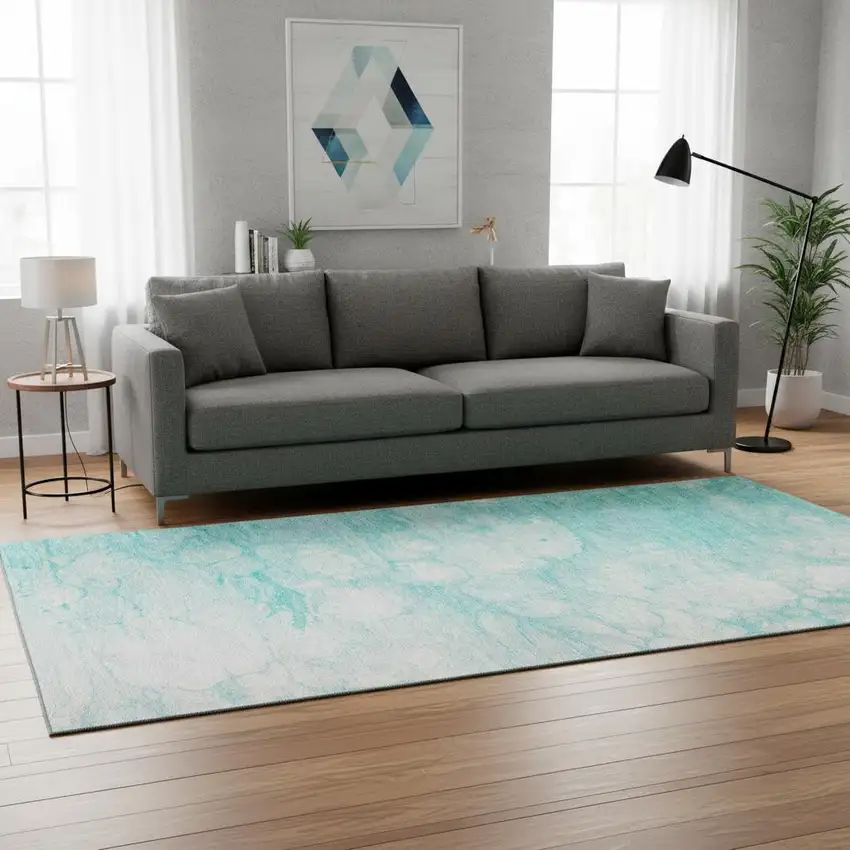 Aqua And Ivory Abstract Washable Area Rug With UV Protection Photo 1