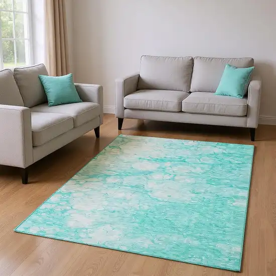 Aqua And Ivory Abstract Washable Area Rug With UV Protection Photo 1