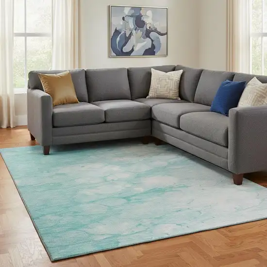 Aqua And Ivory Abstract Washable Area Rug With UV Protection Photo 1