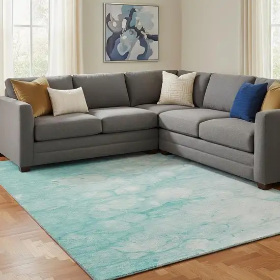 Aqua And Ivory Abstract Washable Area Rug With UV Protection Photo 1