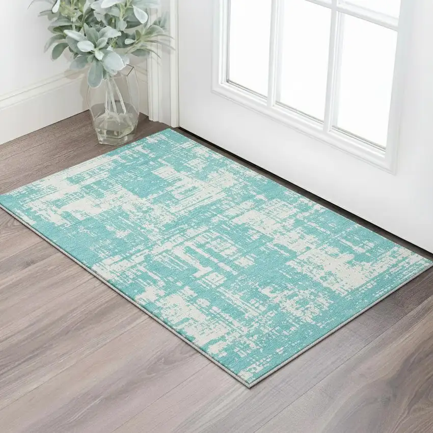 Aqua And Ivory Abstract Washable Area Rug With UV Protection Photo 2