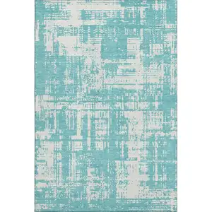 Photo of Aqua And Ivory Abstract Washable Area Rug With UV Protection
