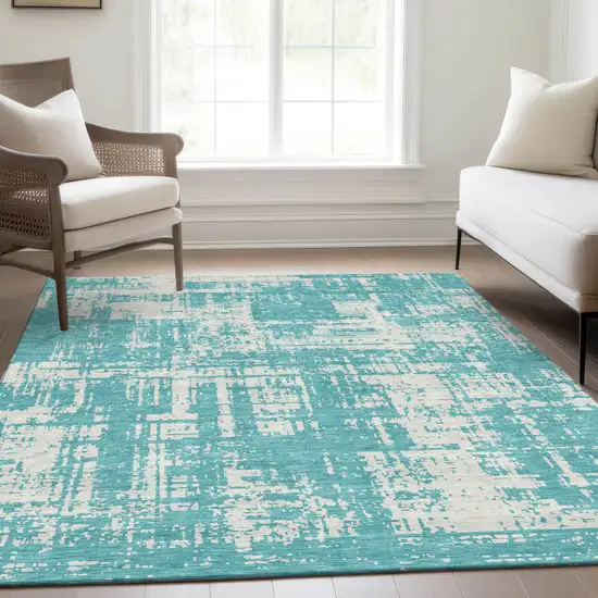 Aqua And Ivory Abstract Washable Area Rug With UV Protection Photo 6