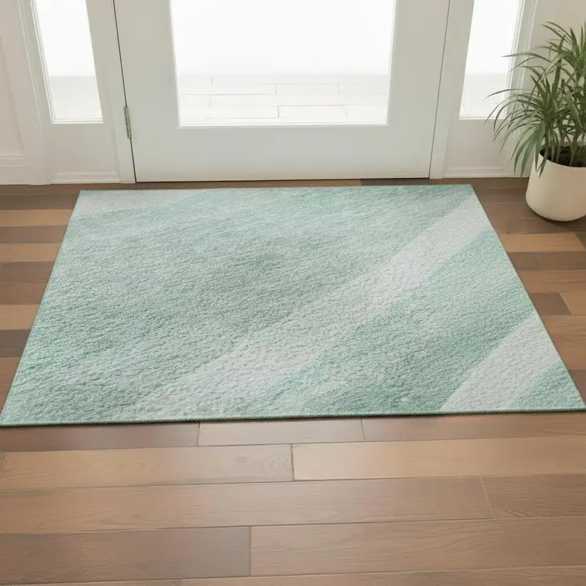 Aqua And Ivory Abstract Washable Area Rug With UV Protection Photo 2