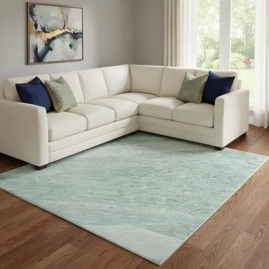 Aqua And Ivory Abstract Washable Area Rug With UV Protection Photo 2