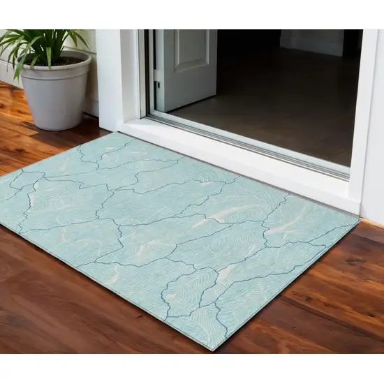 Aqua And Ivory Abstract Washable Indoor Outdoor Area Rug Photo 1