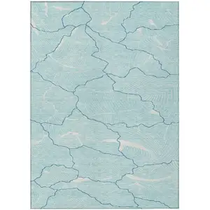 Photo of Aqua And Ivory Abstract Washable Indoor Outdoor Area Rug