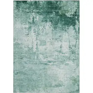 Photo of Aqua And Ivory Abstract Washable Indoor Outdoor Area Rug