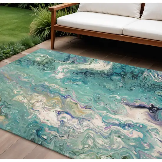 Aqua And Ivory Abstract Washable Indoor Outdoor Area Rug Photo 1