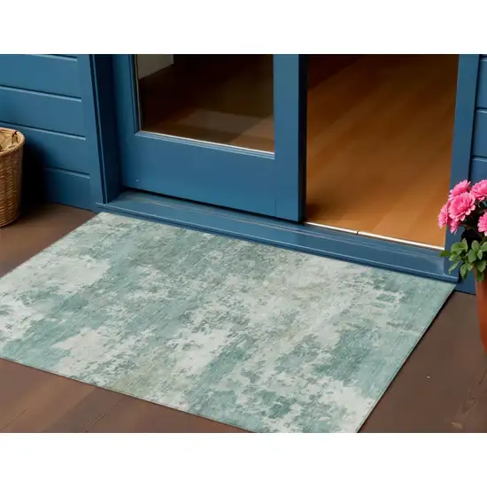 Aqua And Ivory Abstract Washable Indoor Outdoor Area Rug Photo 1