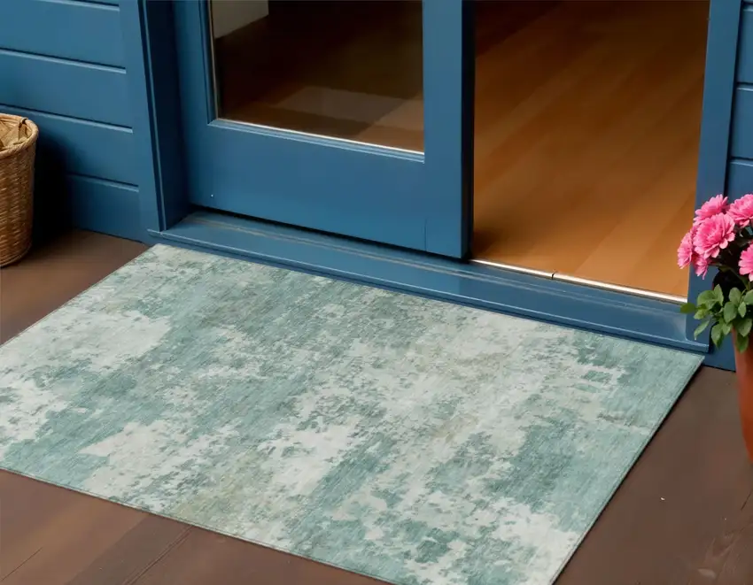 Aqua And Ivory Abstract Washable Indoor Outdoor Area Rug Photo 1
