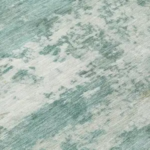 Photo of Aqua And Ivory Abstract Washable Indoor Outdoor Area Rug