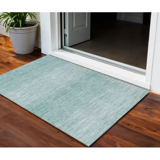 Aqua And Ivory Abstract Washable Indoor Outdoor Area Rug Photo 1