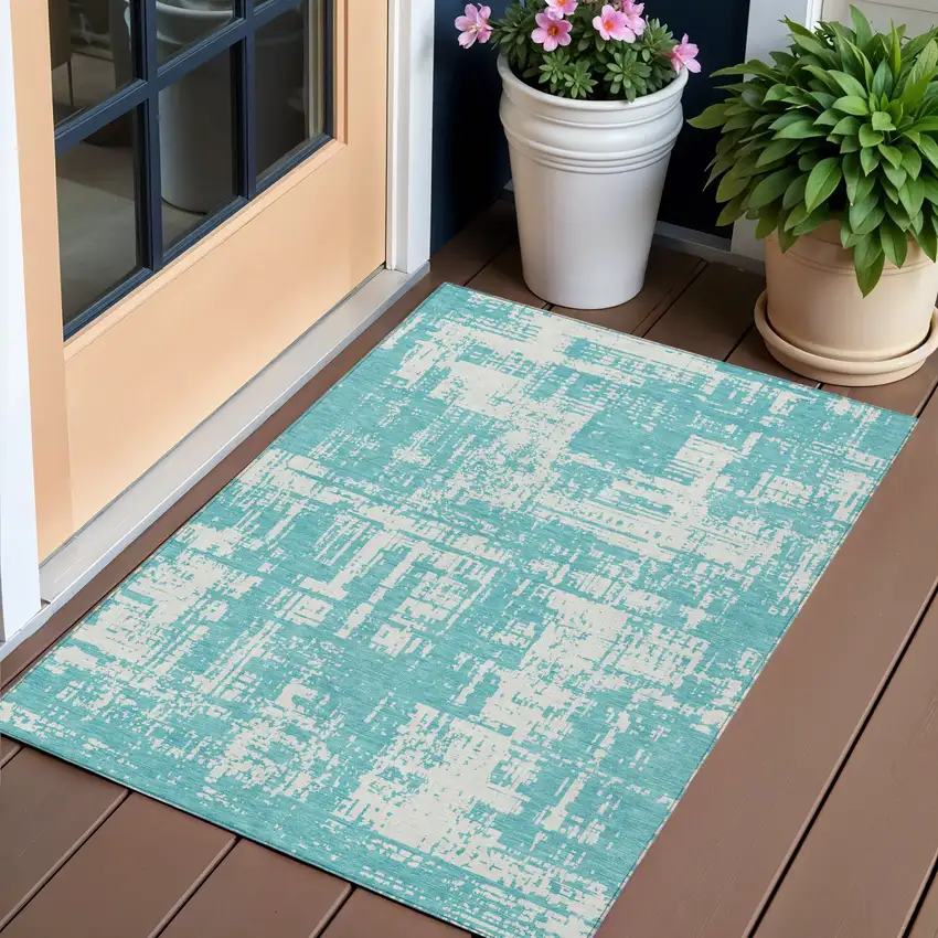 Aqua And Ivory Abstract Washable Indoor Outdoor Area Rug Photo 1