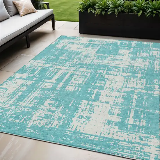 Aqua And Ivory Abstract Washable Indoor Outdoor Area Rug Photo 1