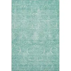 Photo of Aqua And Ivory Damask Washable Area Rug With UV Protection