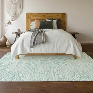 Photo of Aqua And Ivory Diamond Washable Area Rug With UV Protection