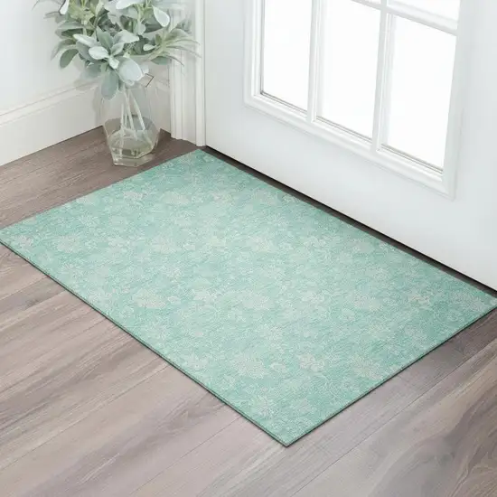 Aqua And Ivory Floral Washable Area Rug With UV Protection Photo 1