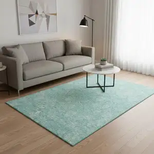 Photo of Aqua And Ivory Floral Washable Area Rug With UV Protection
