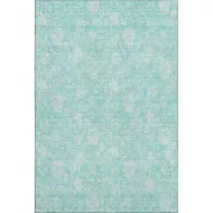 Photo of Aqua And Ivory Floral Washable Area Rug With UV Protection