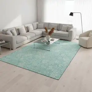 Photo of Aqua And Ivory Floral Washable Area Rug With UV Protection