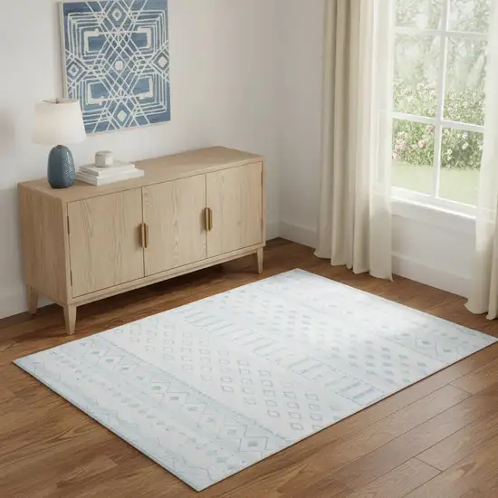 Aqua And Ivory Geometric Distressed Washable Area Rug Photo 1